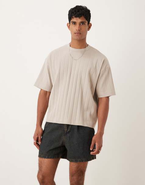 ASOS DESIGN – Kurz geschnittene Jeansshorts in verwaschenem Mittelblau mit Bundfalten - view 1
