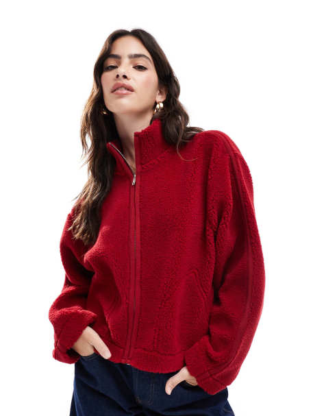 ASOS DESIGN – Kurz geschnittene Teddyfell-Jacke in Rot mit Stehkragen und Besatz an den Ärmeln - view 1