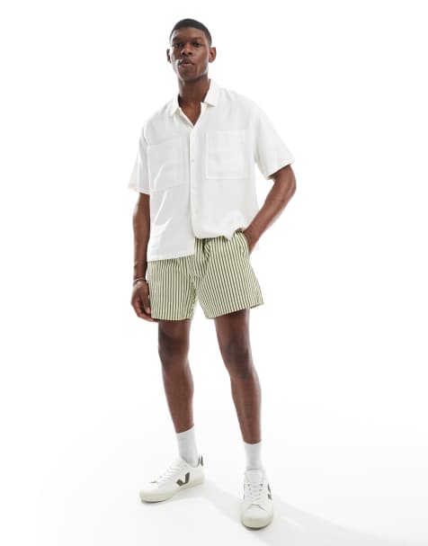 ASOS DESIGN – Kurz und weit geschnittene Shorts in Grün und Weiß gestreift - view 1