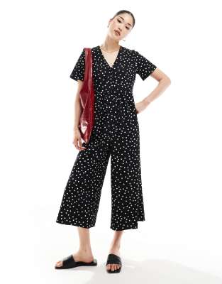 ASOS DESIGN - Kurzärmliger Freizeit-Jumpsuit mit Punktemuster in Schwarz/Weiß-Bunt