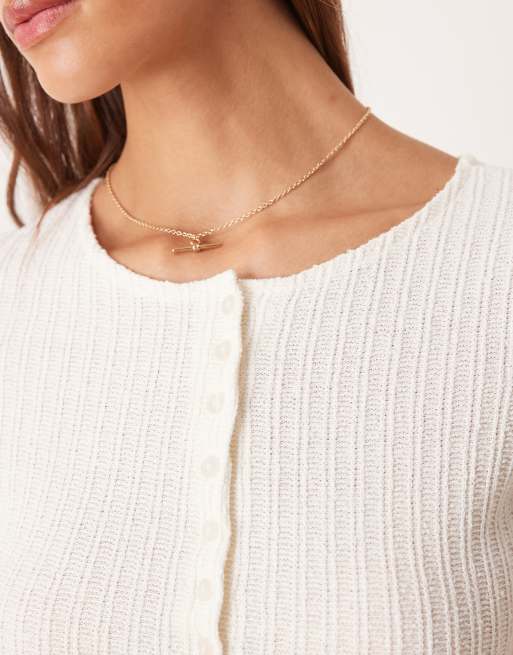 ASOS DESIGN – Kurzärmliges, durchgeknöpftes Oberteil aus Häkelstoff in Cremeweiß, Kombiteil, 3 von 4