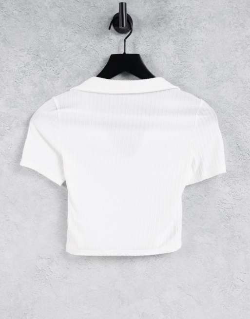 ASOS DESIGN – Kurzärmliges, figurbetontes Polo-Oberteil mit Rippenstruktur in Weiß, 2 von 4