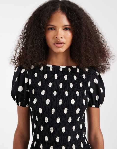 ASOS DESIGN – Kurzärmliges, gesmoktes Oberteil in Schwarz-Weiß mit Polka Dots, Kombiteil - view 1