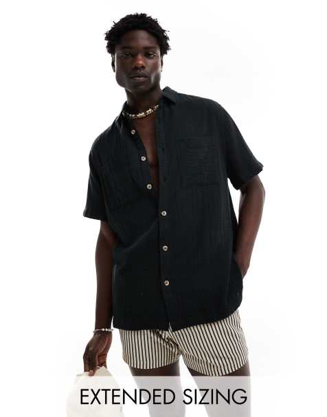 ASOS DESIGN – Kurzärmliges Hemd in Schwarz mit lässigem Schnitt und Reverskragen - view 1