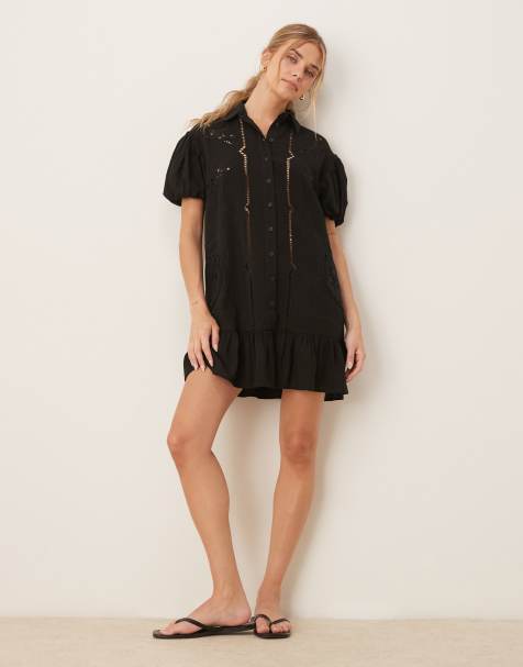 ASOS DESIGN – Kurzärmliges Mini-Hemdblusenkleid aus Twill in Schwarz mit Lochstickerei und gleichfarbigen Ziernähten - view 1