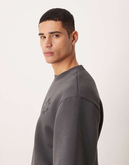 ASOS DESIGN – Kurzärmliges Relaxed-Fit-Sweatshirt in verwaschenem Schwarz mit Print, 4 von 5