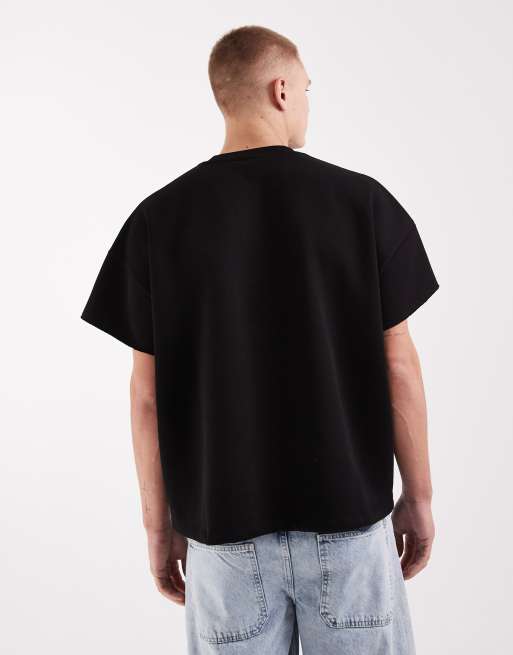 ASOS DESIGN – Kurzärmliges Sweatshirt in Schwarz mit extremer Oversize-Passform und ungesäumten Kanten, 4 von 5
