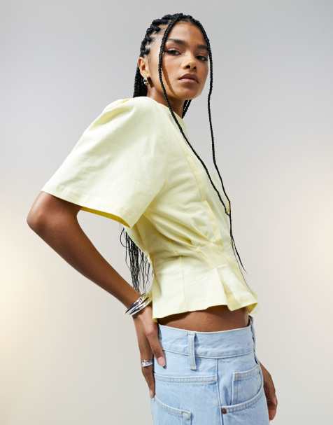 ASOS DESIGN – Kurzärmliges T-Shirt in Buttermilchgelb mit Ziernähten und Korsett-Taille - view 1