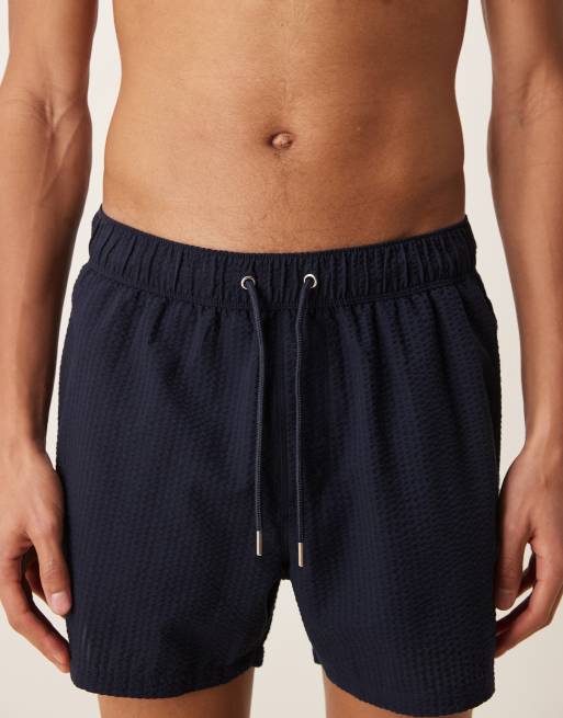 ASOS DESIGN – Kurze Badeshorts aus Seersucker in Marineblau, 5 von 5