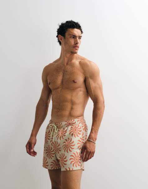 ASOS DESIGN – Kurze Badeshorts in Beige mit Blumenmuster, Kombiteil - view 1