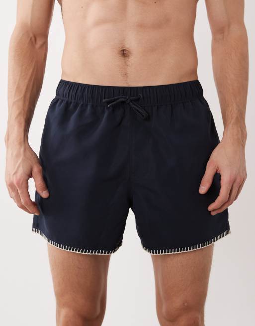 ASOS DESIGN – Kurze Badeshorts in Marineblau mit Stickerei, 5 von 6