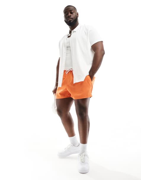 ASOS DESIGN – Kurze Badeshorts in Orange - view 1