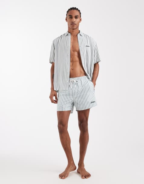 ASOS DESIGN – Kurze Badeshorts in Weiß mit grünen Streifen und Stickerei - view 1