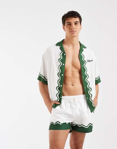 ASOS DESIGN – Kurze Badeshorts in Wollweiß mit Bordürenmuster, Kombiteil - view 1