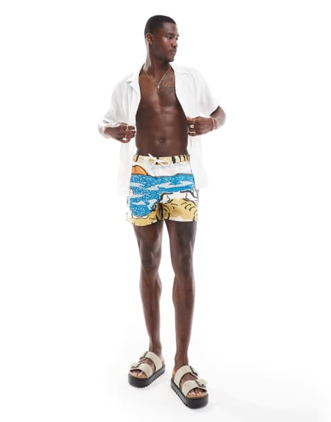 ASOS DESIGN – Kurze Badeshorts mit Location-Print - view 1
