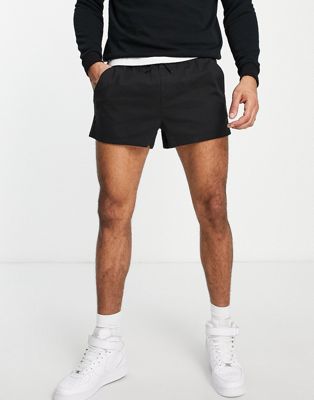 ASOS DESIGN slim chino shorter shorts with elasticated waist in black - ASOS Price Checker