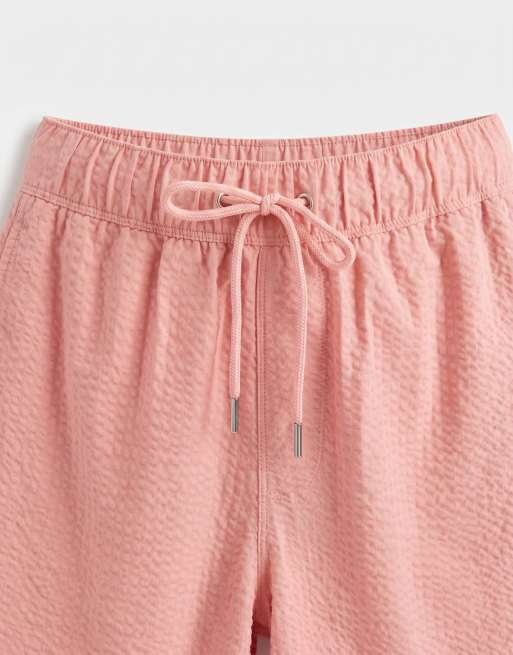 ASOS DESIGN – Kurze Seersucker-Badeshorts in Rosa, 9 von 9