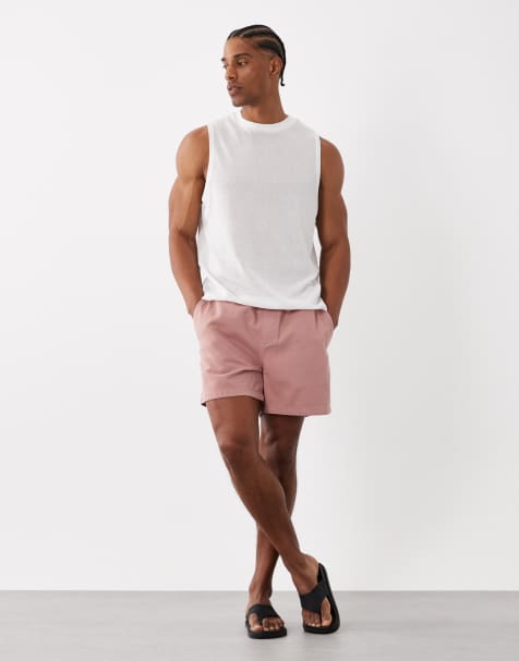 ASOS DESIGN – Kürzer geschnittene, weite Shorts in Rosa mit elastischem Bund - view 1