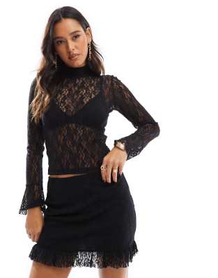 ASOS DESIGN - Kurzer Spitzenrock in Schwarz mit Rüschensaum, Kombiteil