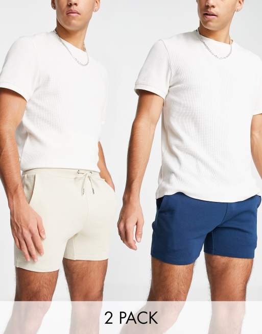 ASOS DESIGN – Kürzere Jersey-Shorts mit engem Schnitt in Beige/Marineblau im 2er-Pack