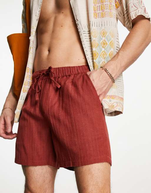 ASOS DESIGN Kurzere strukturierte Shorts in Orange mit schmalem Schnitt ASOS