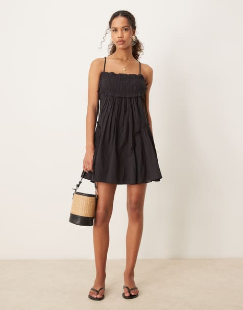 ASOS DESIGN – Kurzes Babydoll-Sommerkleid in Schwarz mit Rüschensaum - view 1