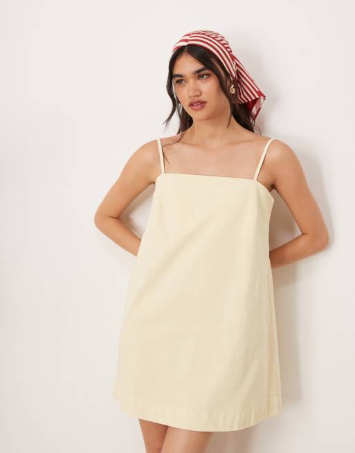 ASOS DESIGN denim cami mini dress in buttermilk