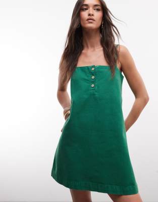 Kurzes Jeans-Trägerkleid in Grün mit Knopfdetail Grün 44