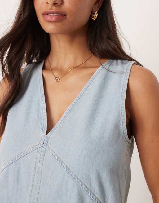 ASOS DESIGN – Kurzes, schwingendes A-Linien-Jeanskleid in Mittelblau, 3 von 4