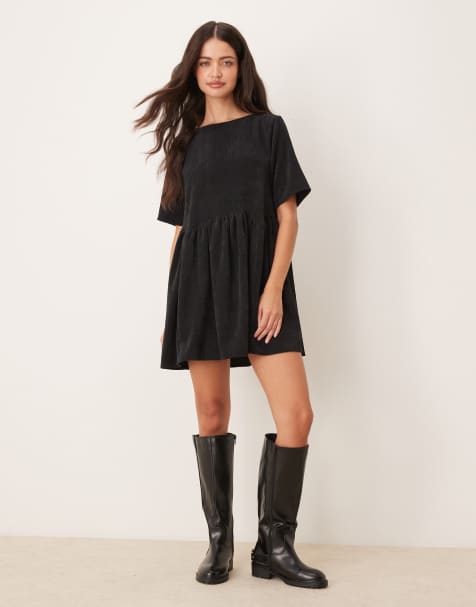 ASOS DESIGN – Kurzes T-Shirt-Hängerkleid aus Cord in Schwarz mit Ziernaht in der Taille - view 1