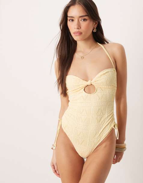 ASOS DESIGN Kyle eyelet cut out swimsuit in buttermilk - view 1
