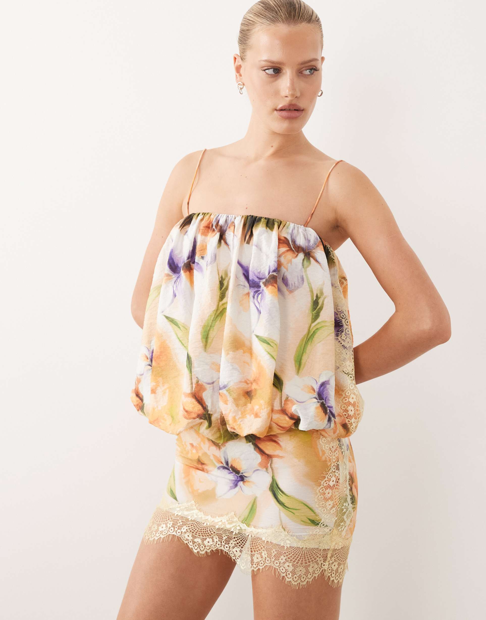 asos design lace applique bubble hem mini dress in blurred floral print