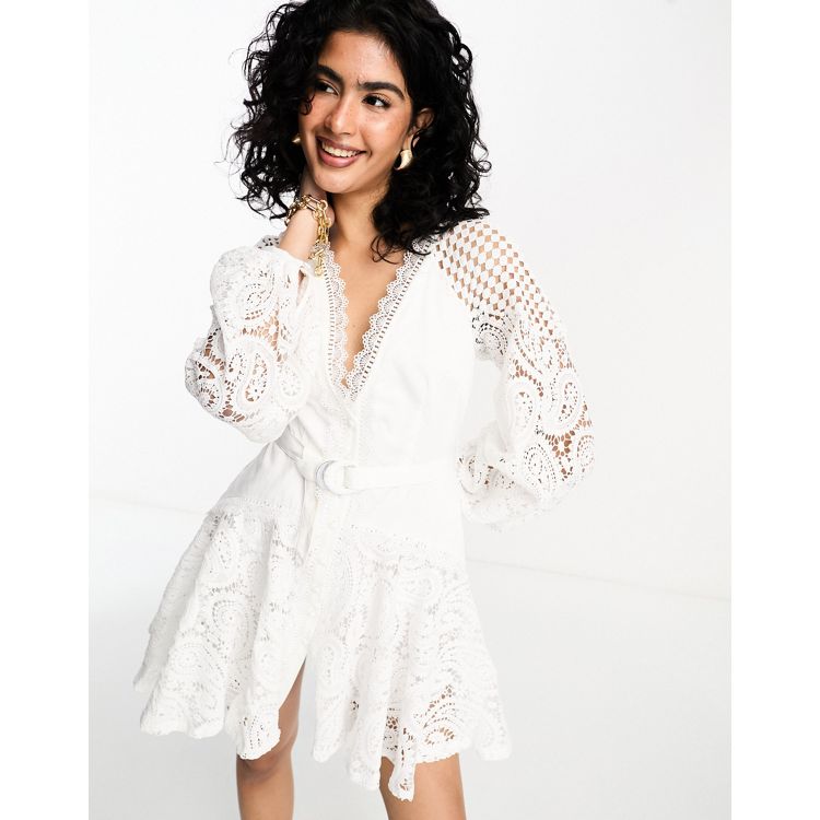ASOS DESIGN crochet lace cross strap mini dress with flare sleeves in white