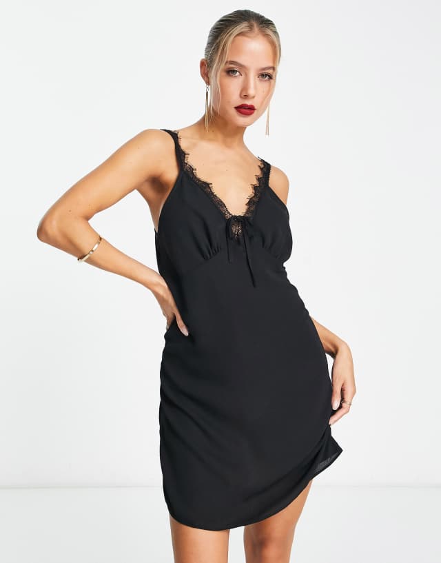 ASOS DESIGN lace insert mini slip dress in black