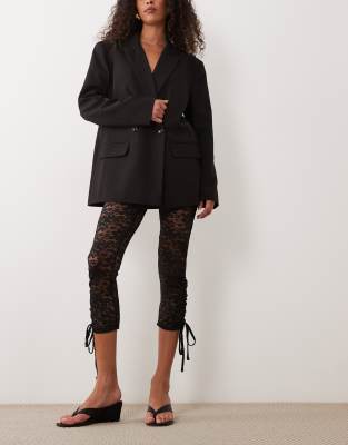 Asos Design Lace Leggings With Bow Hem Detailing In Black