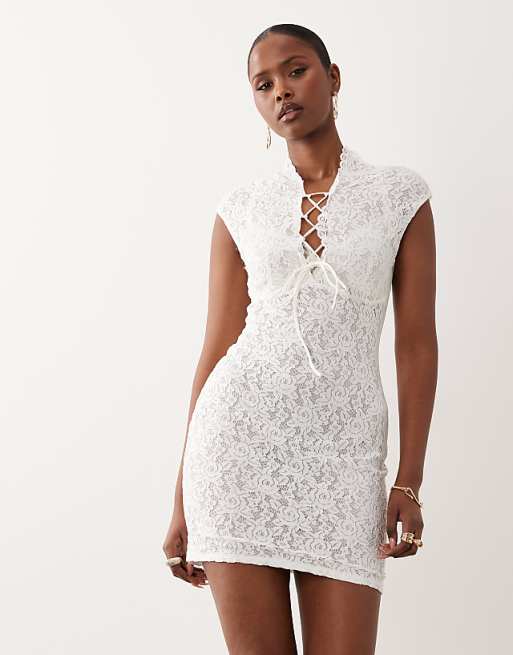 white formal mini dress Talia Also included are elegant sheer long sleeves Womens Six Stories White Lace