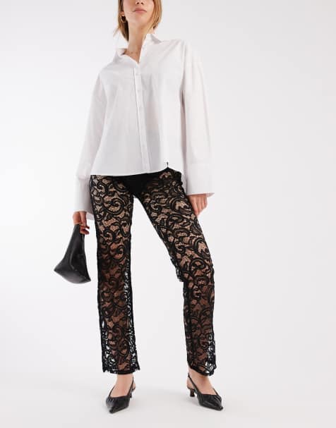ASOS DESIGN lace slim flare trousers in black - view 1