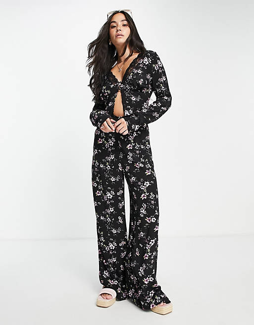 Women lace trim button through overlay jumpsuit in grunge floral 