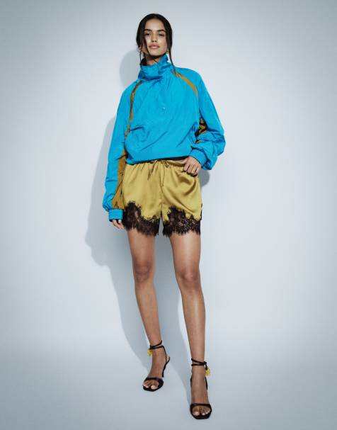 ASOS DESIGN lace trim drawstring waist satin shorts in ocher - view 1