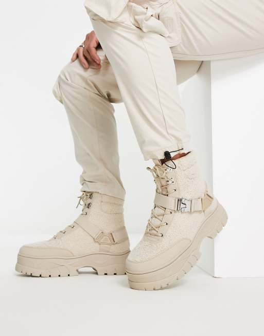ASOS DESIGN lace up boot in beige sherpa with strap detail on chunky sole