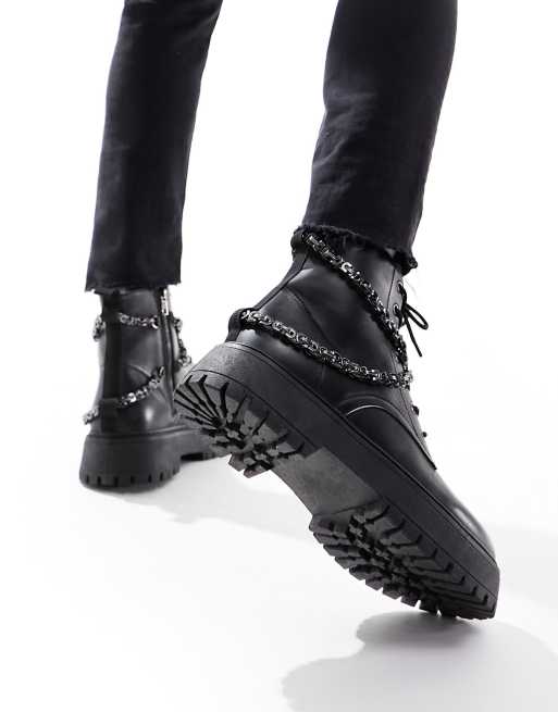 ASOS DESIGN lace up boot in black faux leather with chunky sole and studs