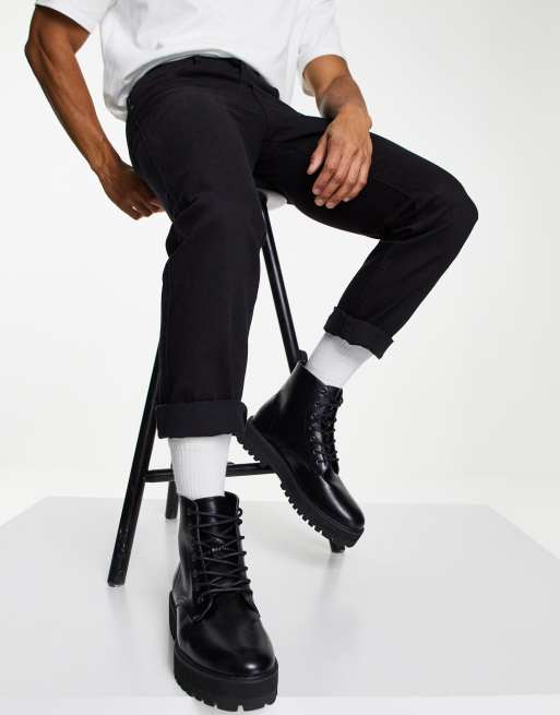 ASOS DESIGN lace up boot in black faux leather with raised chunky sole