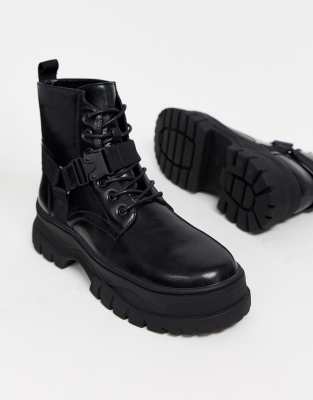 ASOS DESIGN lace up boot with chunky sole and studded strapping in black  faux leather