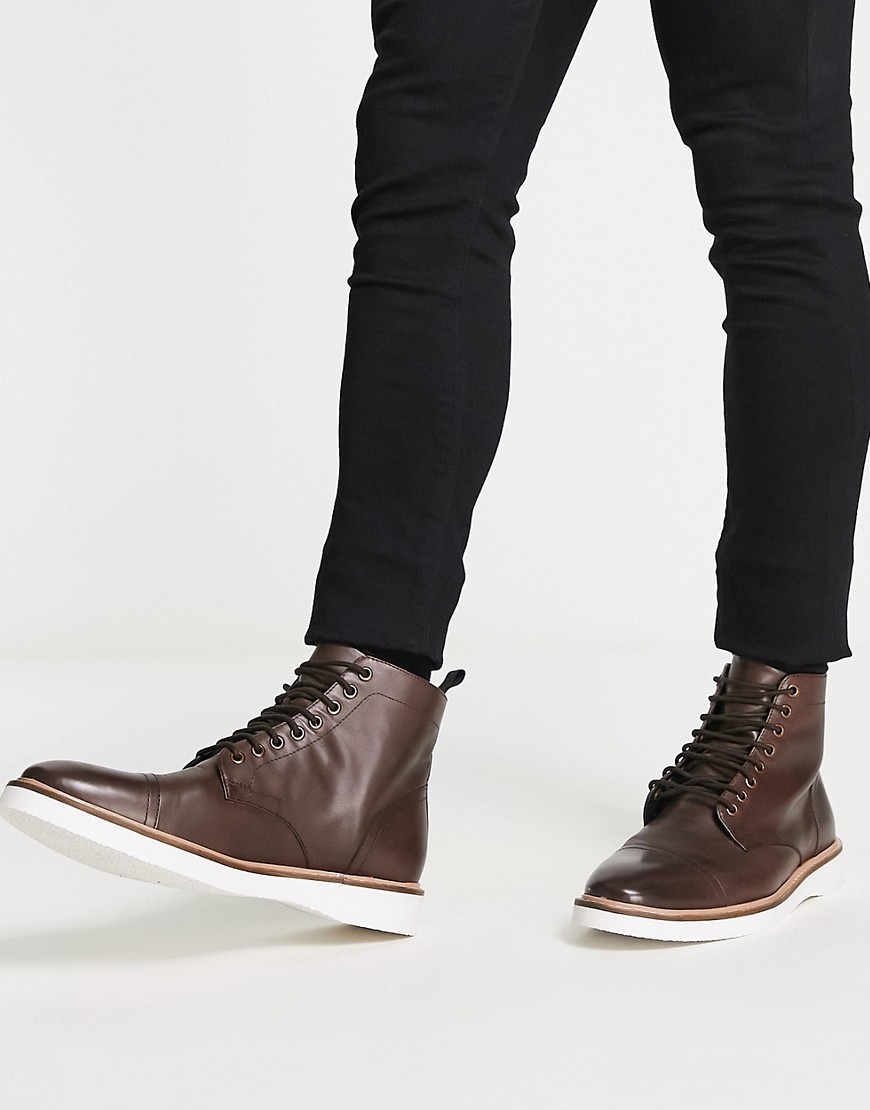 ASOS DESIGN lace up boot in brown leather with white wedge sole