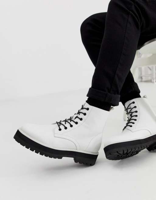 White boots store black laces