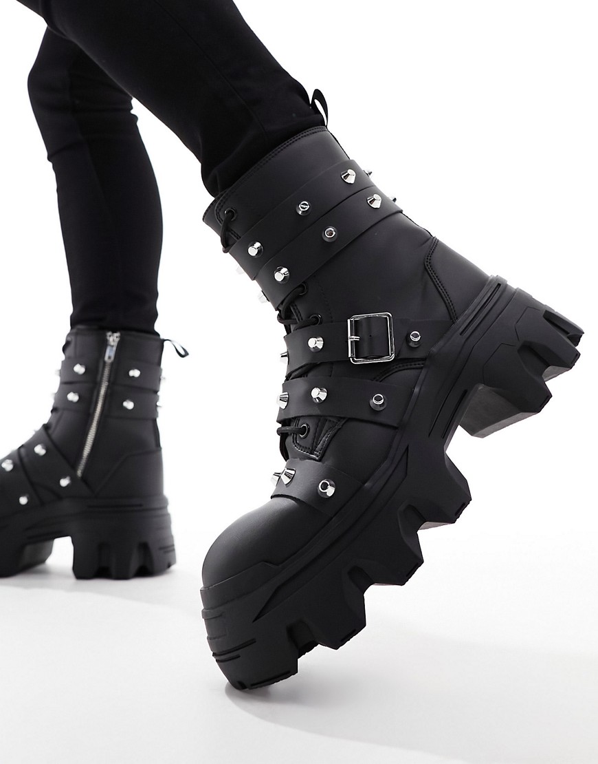 ASOS DESIGN lace up boot with chunky sole and studded strapping in black faux leather