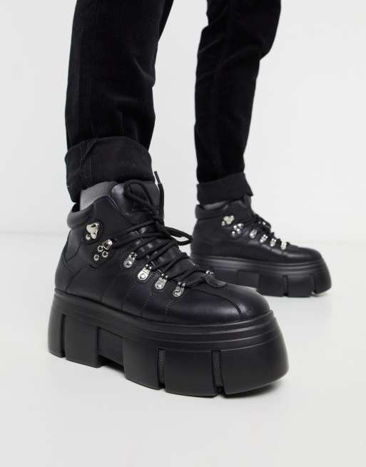 ASOS DESIGN lace up boot with chunky sole and studded strapping in black  faux leather