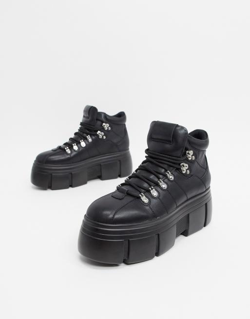 ASOS DESIGN lace up boot with chunky sole and studded strapping in black  faux leather