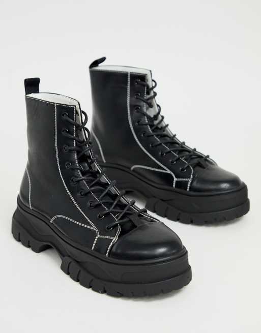 Black boots on sale with white stitching