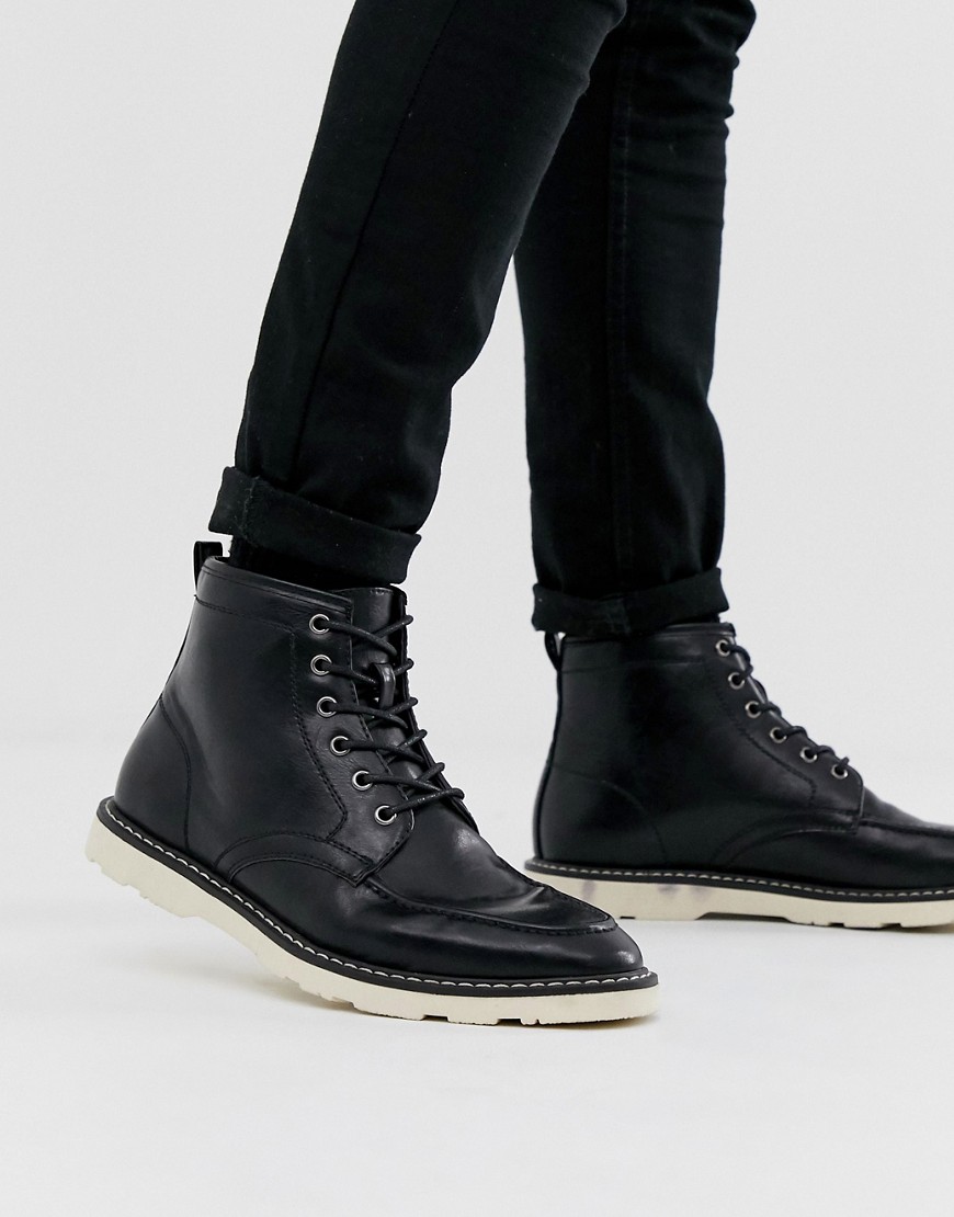 ASOS DESIGN lace up boots in black faux leather with white sole